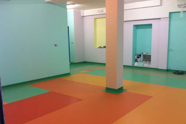 This image shows a school floor with rubber painted floor.